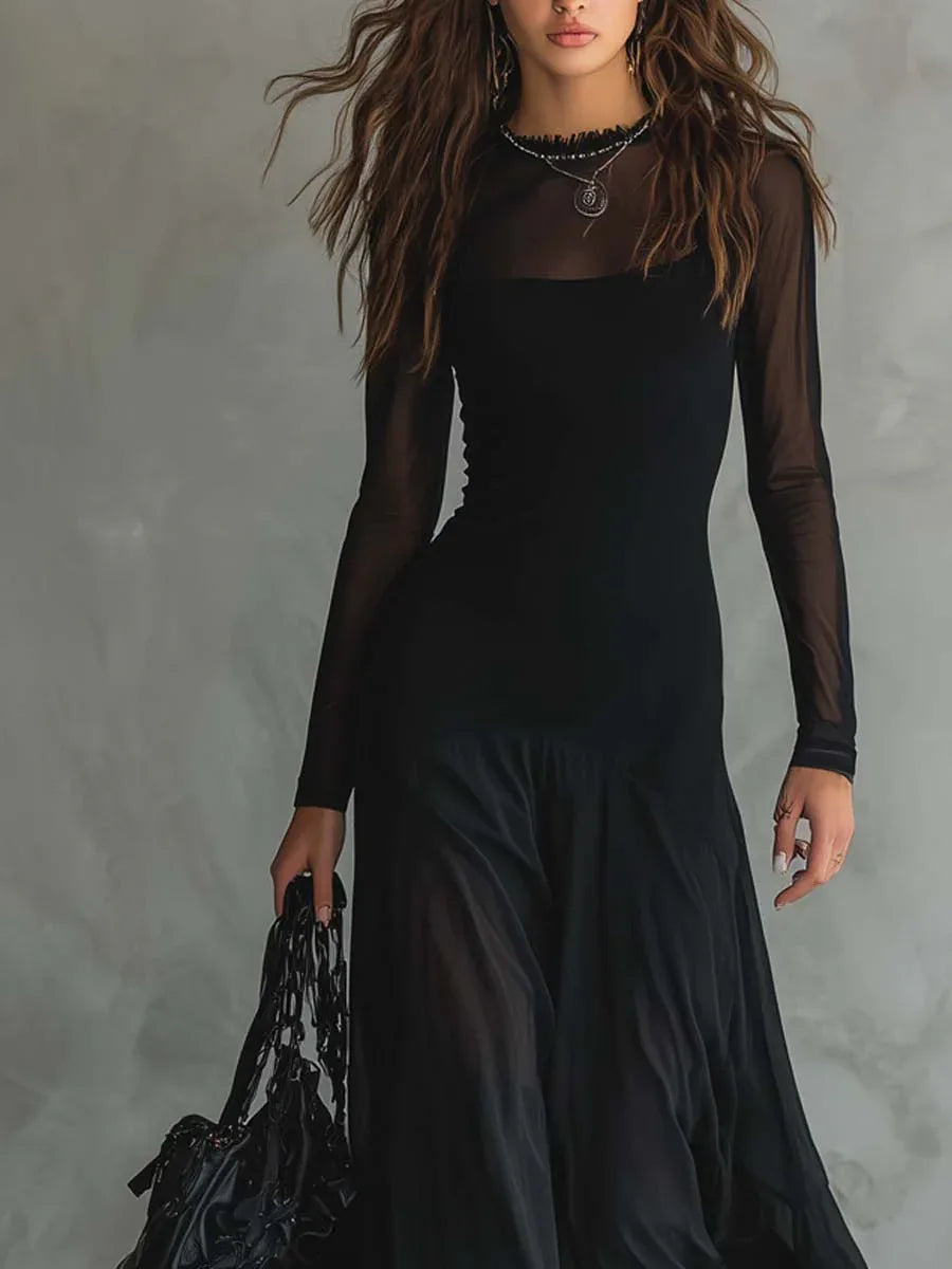 Women's black maxi dress with sheer layers and long sleeves, front view, closer look