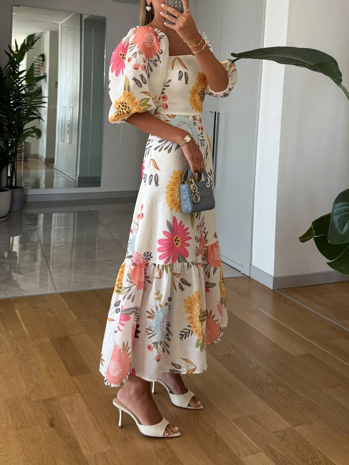 Women's floral midi dress with square neck and puff sleeves, full-length view