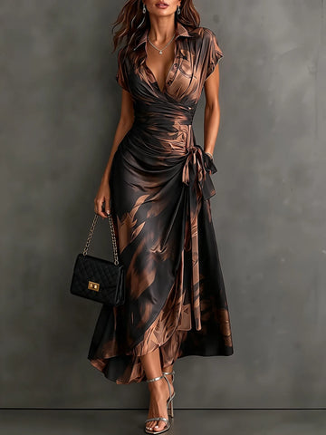Women's abstract print wrap midi dress with tie waist, brown, front view with handbag