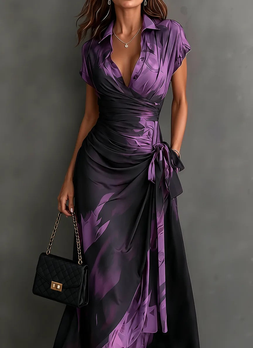 Women's abstract print wrap midi dress with tie waist, front view with handbag