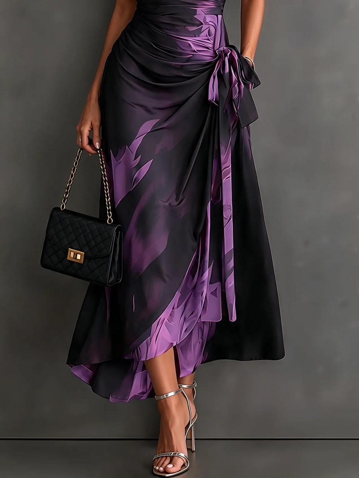 Women's abstract print wrap midi dress with tie waist, side view showing the ruffled hem