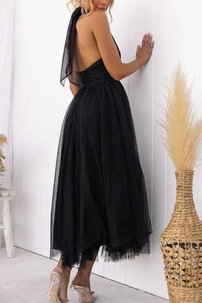 Women's adjustable-tie halter maxi dress with flowing skirt, black, back view