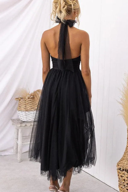 Women's adjustable-tie halter maxi dress with flowing skirt, black, back view