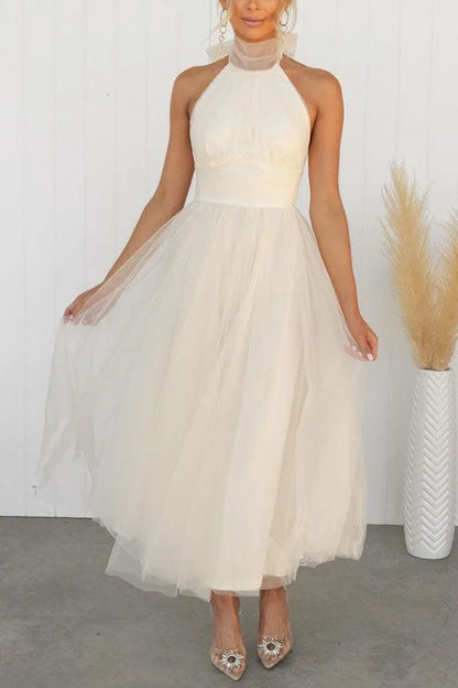 Women's adjustable-tie halter maxi dress with flowing skirt, cream, front view