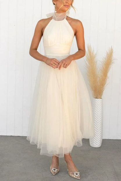 Women's adjustable-tie halter maxi dress with flowing skirt, cream, front view