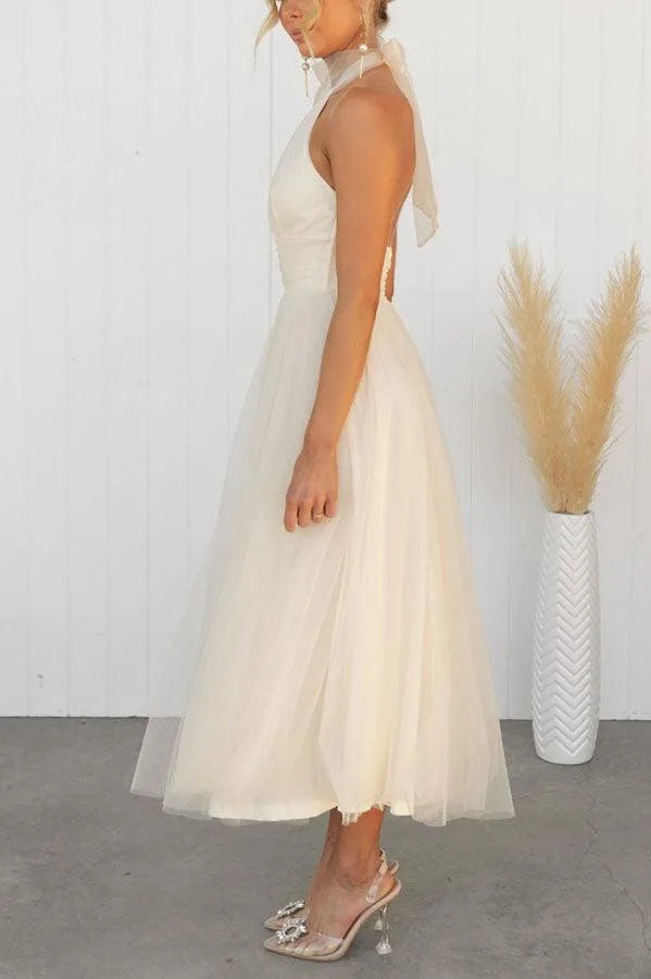 Women's adjustable-tie halter maxi dress with flowing skirt, cream, side view