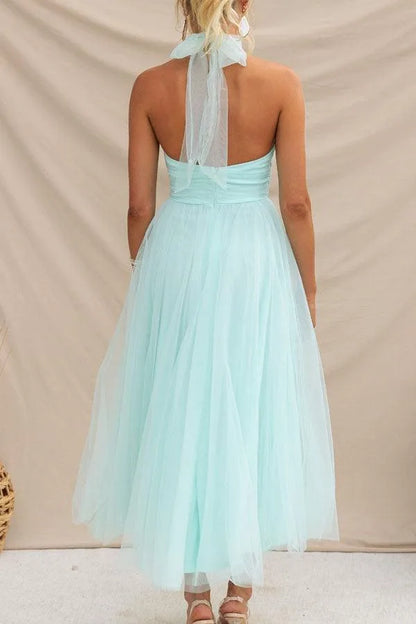 Women's adjustable-tie halter maxi dress with flowing skirt, green, back view