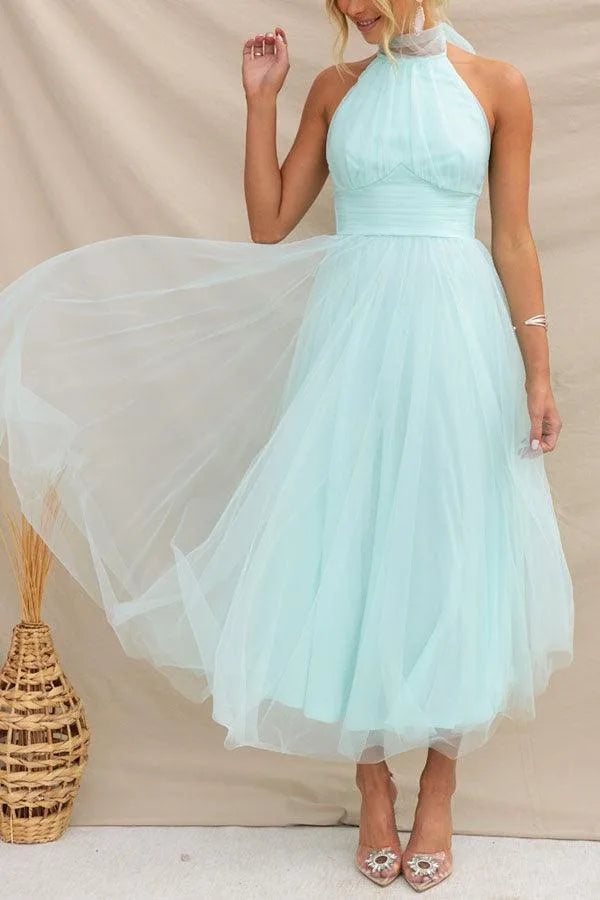 Women's adjustable-tie halter maxi dress with flowing skirt, green, skirt in motion
