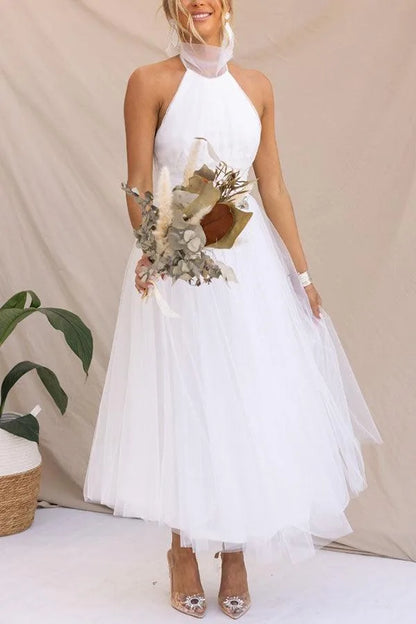 Women's adjustable-tie halter maxi dress with flowing skirt, white, front view