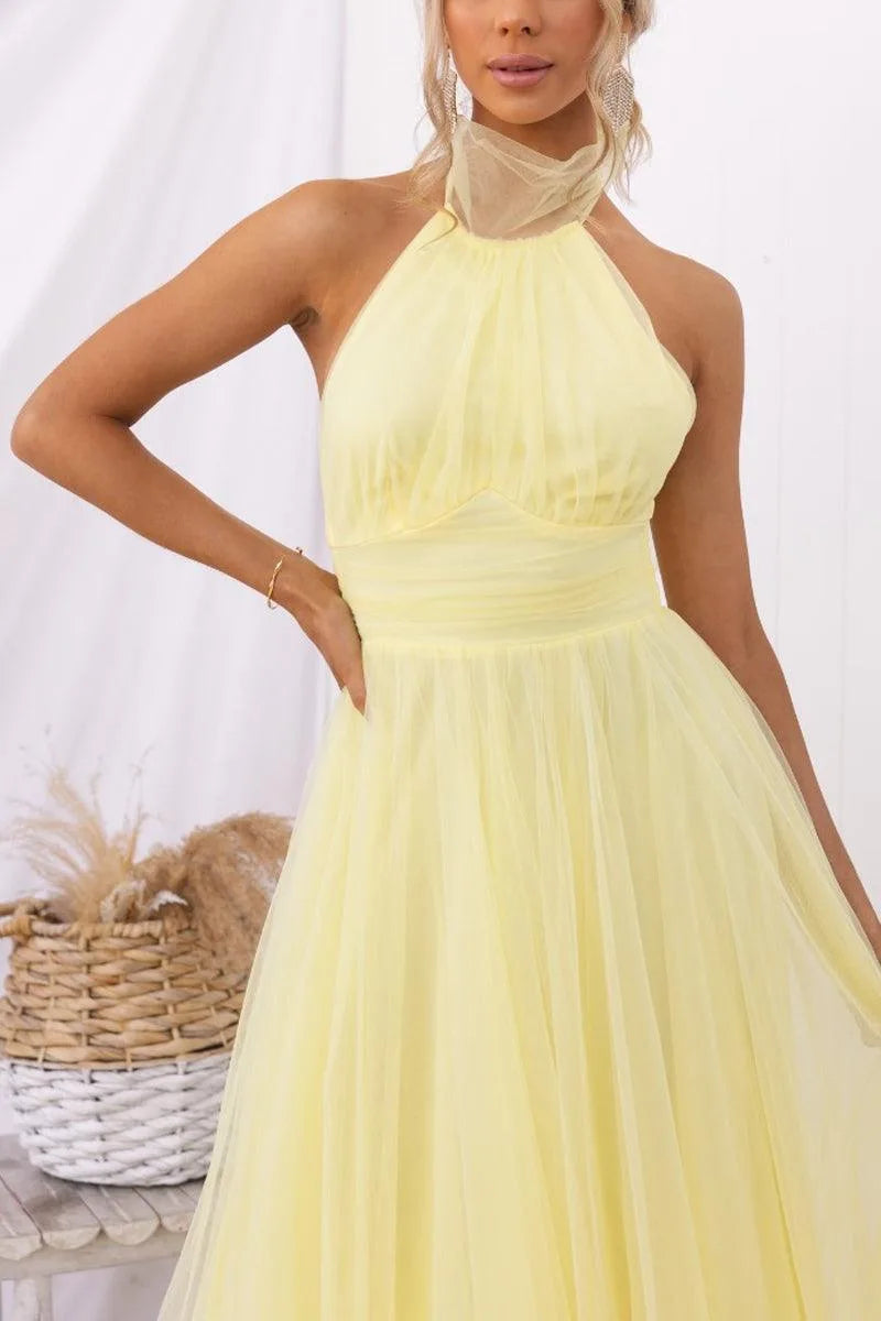 Women's adjustable-tie halter maxi dress with flowing skirt, yellow, front view