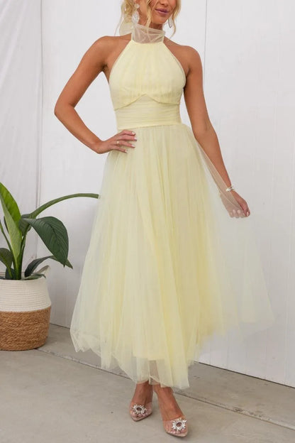 Women's adjustable-tie halter maxi dress with flowing skirt, yellow, front view