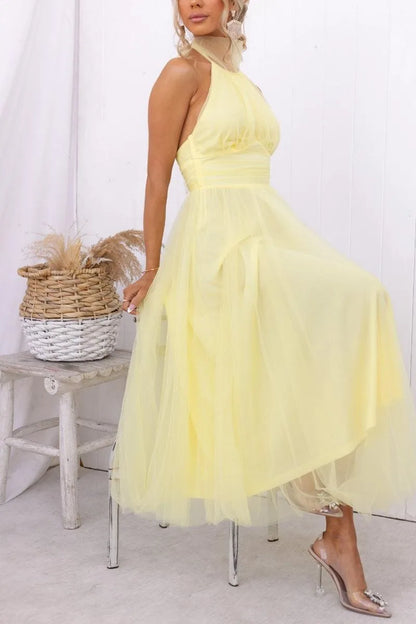 Women's adjustable-tie halter maxi dress with flowing skirt, yellow, side view