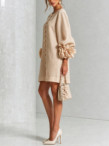 Women's beige button-front mini dress with floral rose cuffs, side view