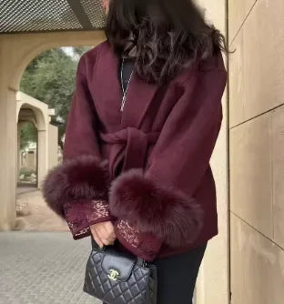 Women's belted wrap coat with fur-style cuffs, burgundy, front view