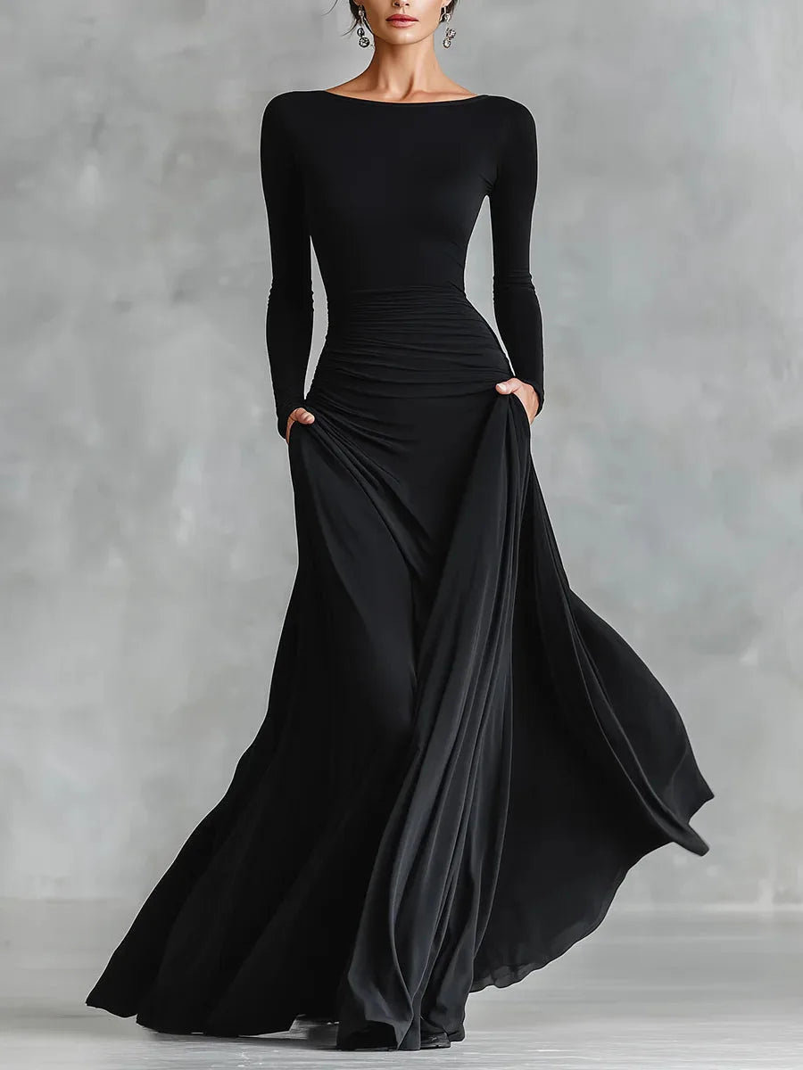 Women's black boat-neck maxi dress with flowing skirt, front view