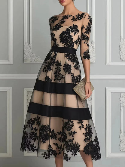Women's black floral lace midi dress with banded skirt, front view