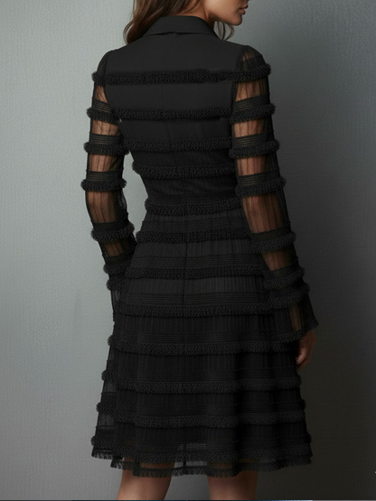 Black fringe mini dress, back view