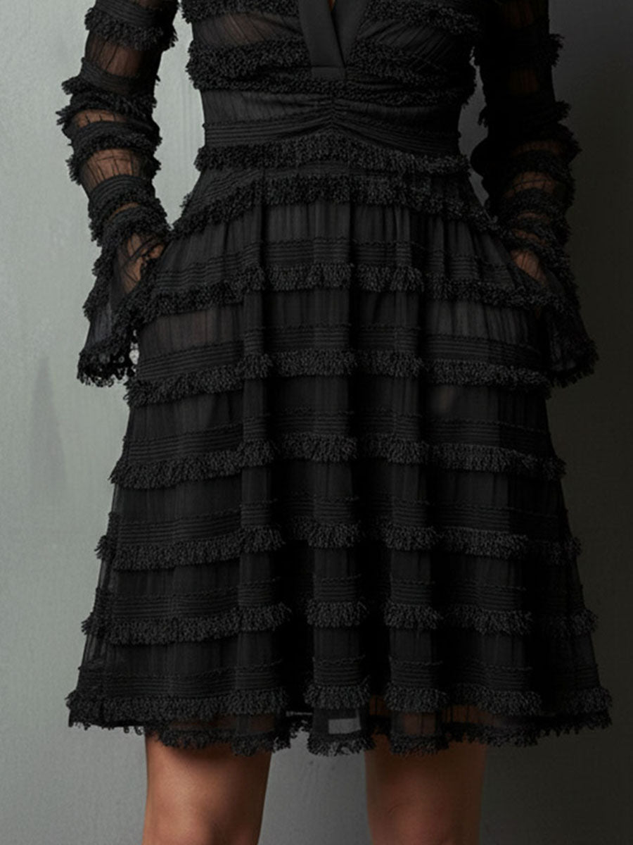 Fringe and sheer layer skirt detail