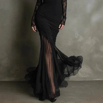 Women's black lace deep V-neck mermaid maxi dress, side view of the mermaid hem
