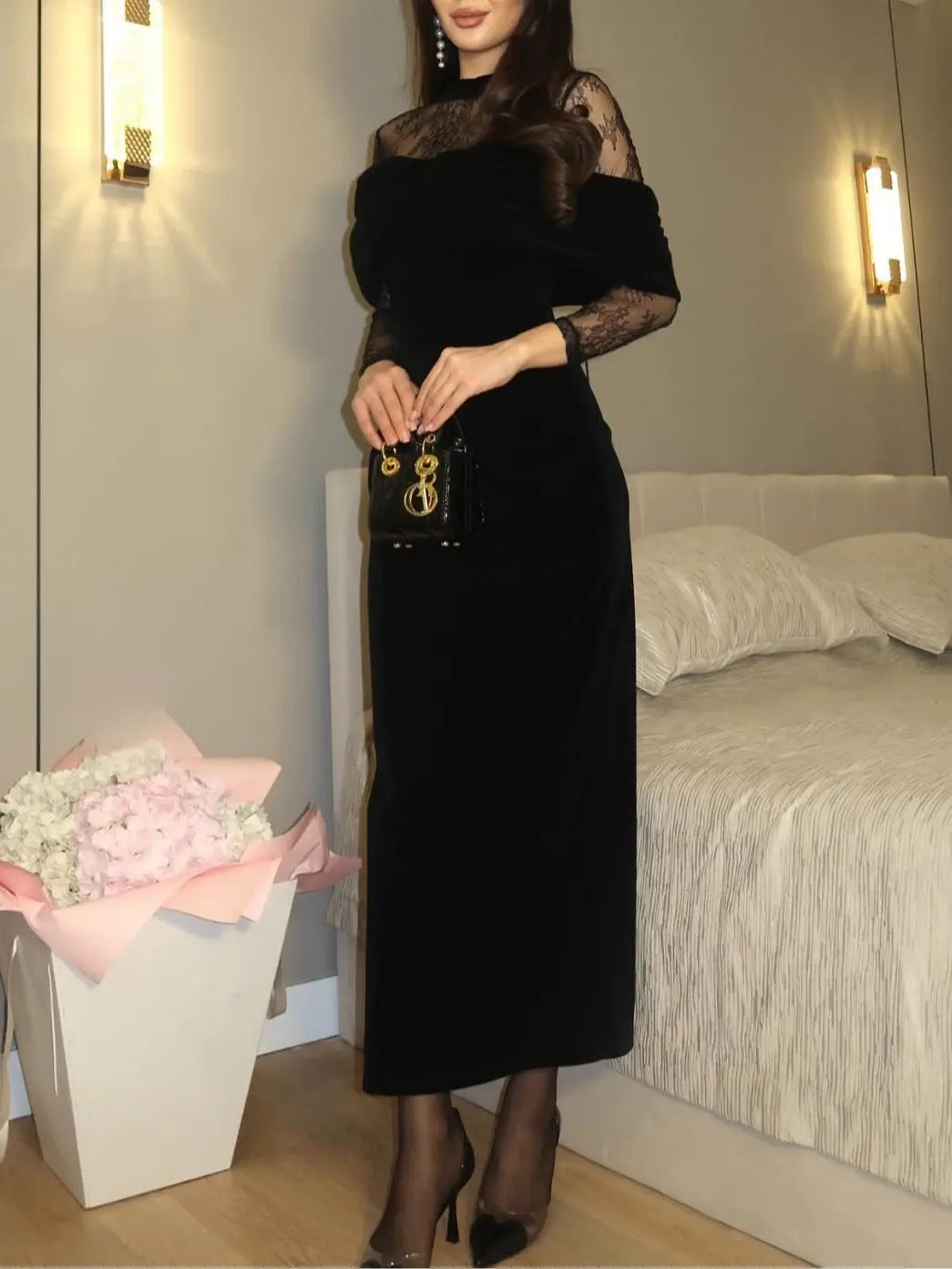 Black fitted maxi dress, back view