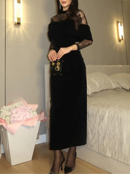 Black fitted maxi dress, back view