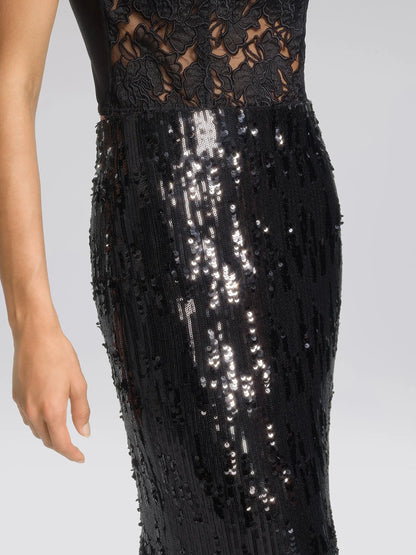 Women's black sequin fringe midi skirt with slit, close-up of the sequins and lace waist
