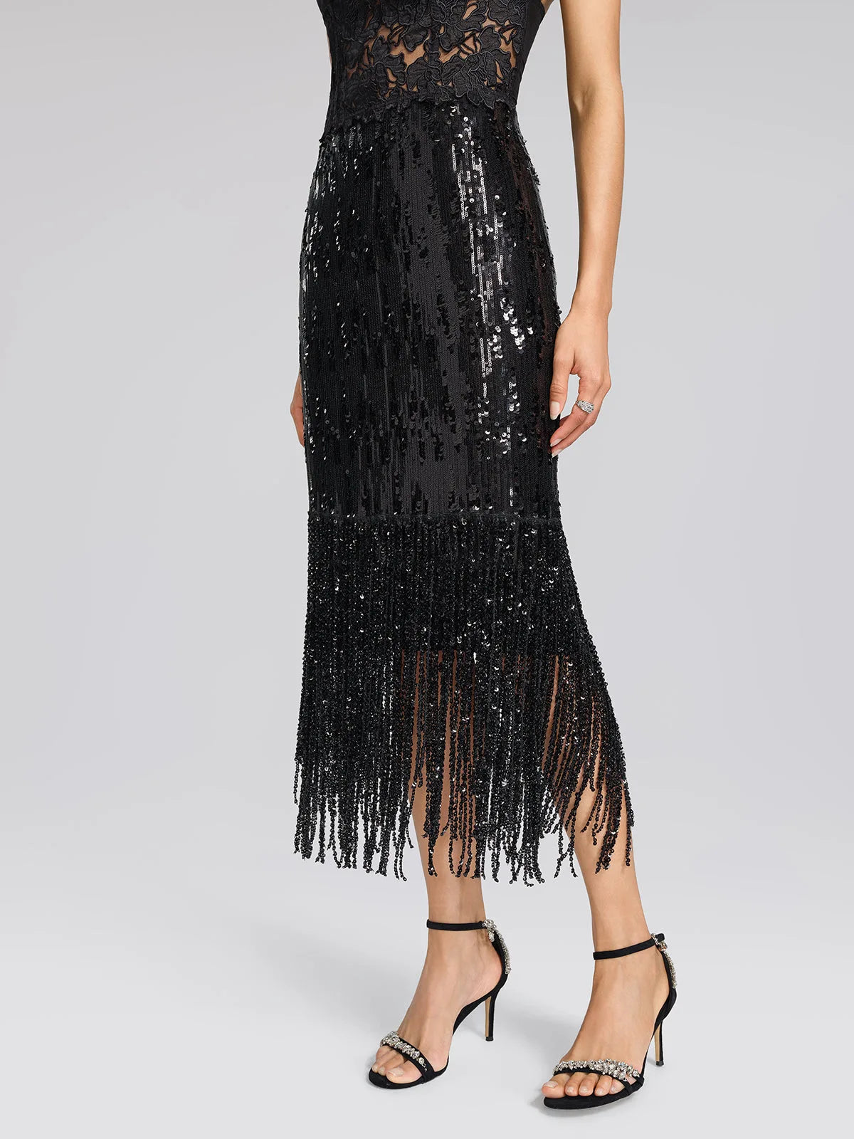 Women's black sequin fringe midi skirt with slit, front view