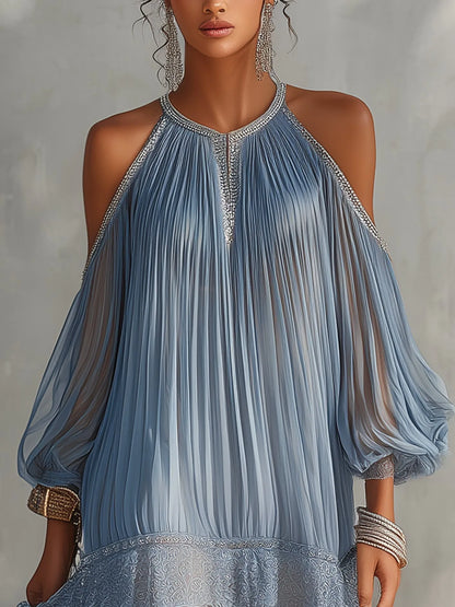 Women's blue cold-shoulder mini dress with lace hem, close-up of the cold-shoulder neckline