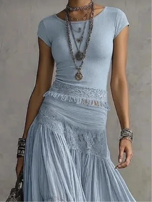 Women's blue lace-paneled top and pleated maxi skirt set, close-up of the top and skirt waist