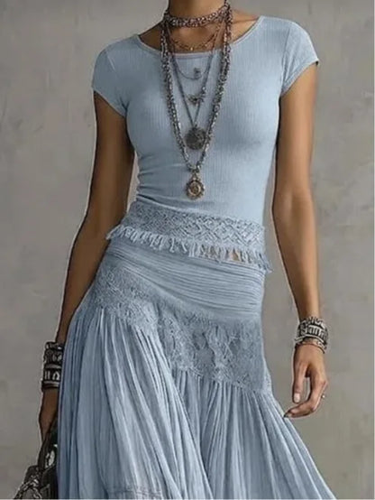 Women's blue lace-paneled top and pleated maxi skirt set, close-up of the top and skirt waist