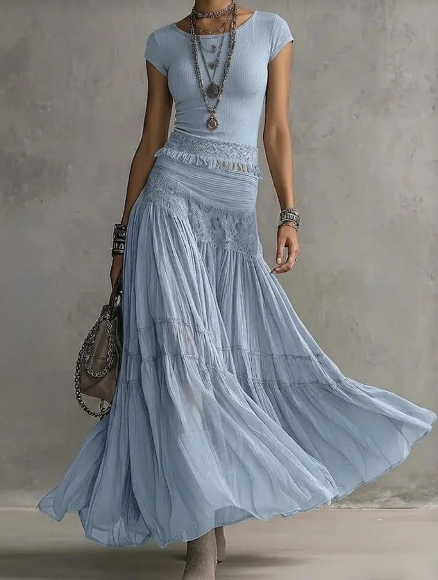 Women's blue lace-paneled top and pleated maxi skirt set, front view