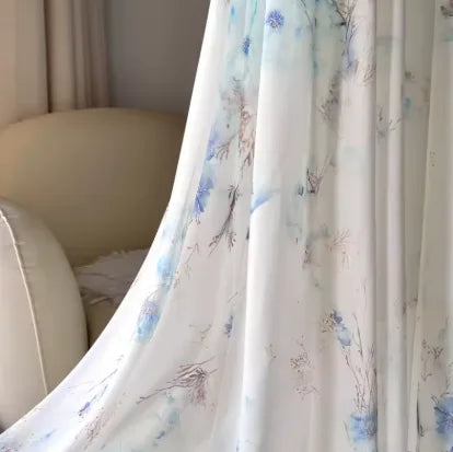 Women's boho floral maxi dress with puff sleeves, close-up of the floral skirt