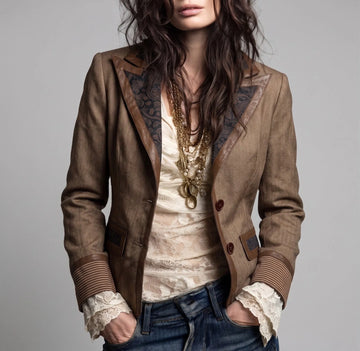 Women's brown fitted blazer with contrast lapels, front view with jeans