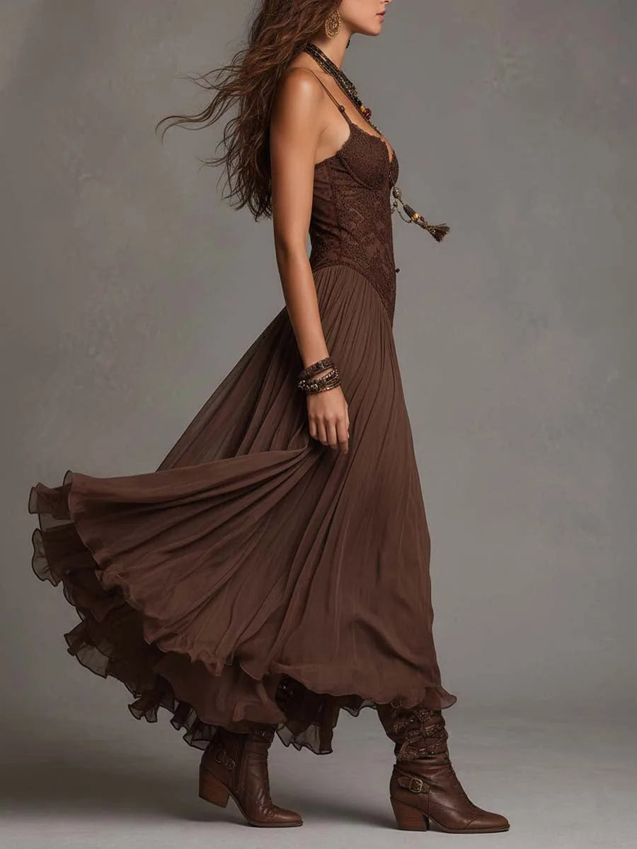 Women's brown lace-bodice maxi dress with flowing skirt, side view