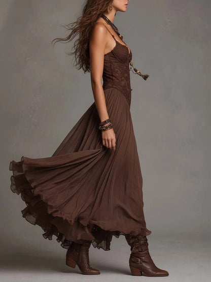 Women's brown lace-bodice maxi dress with flowing skirt, side view