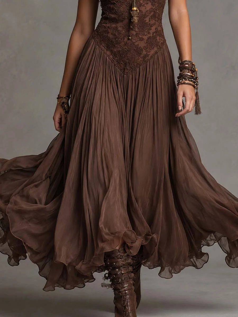 Women's brown lace-bodice maxi dress with flowing skirt, skirt in motion