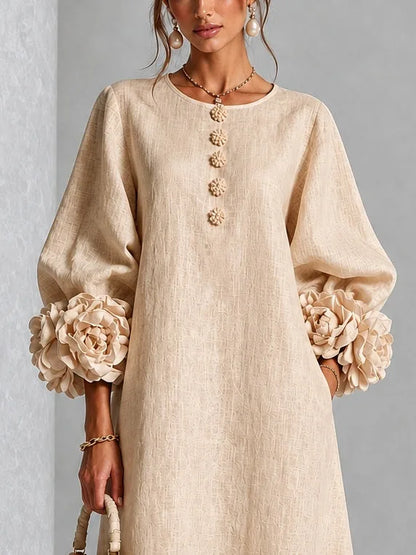 Women's button-front midi dress with floral rose cuffs, beige, close-up of the buttons and rose cuff