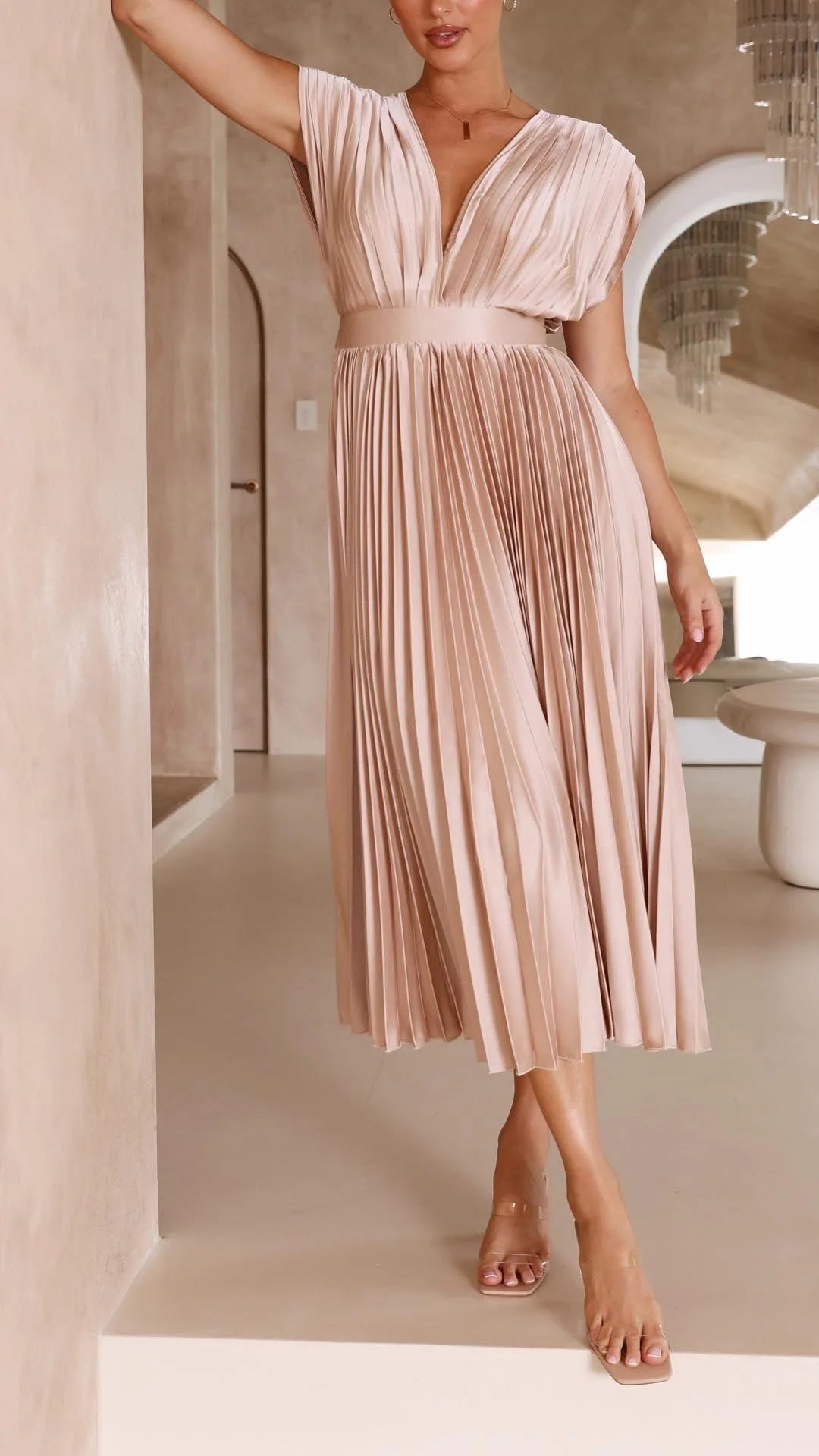Women's draped V-neck pleated midi dress with cap sleeves, light pink, front view