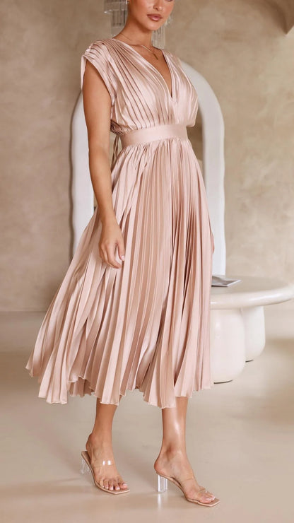 Women's draped V-neck pleated midi dress with cap sleeves, light pink, skirt in motion
