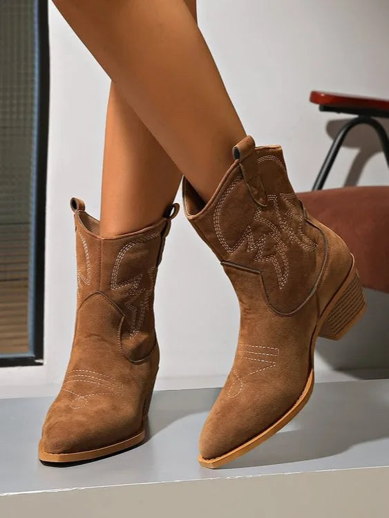 Women's embroidered western ankle boots with block heel, worn view