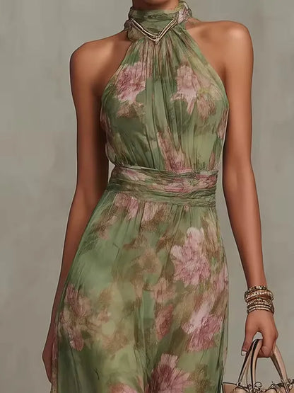 Women's floral halter maxi dress with gathered waist, close-up of the halter neckline and waist