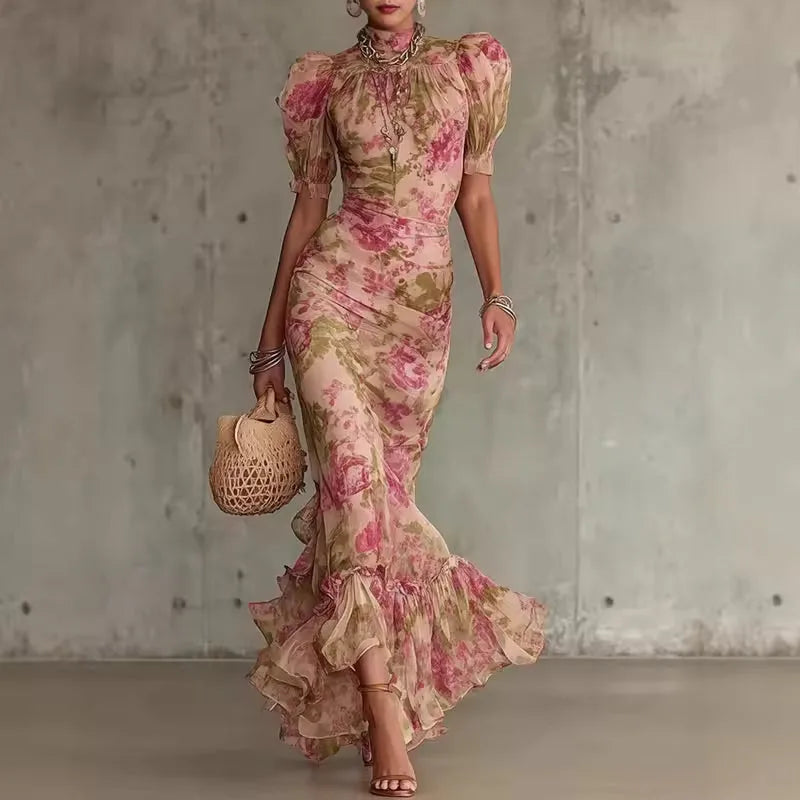 Women's pink floral maxi dress with high neck and puff sleeves, front view