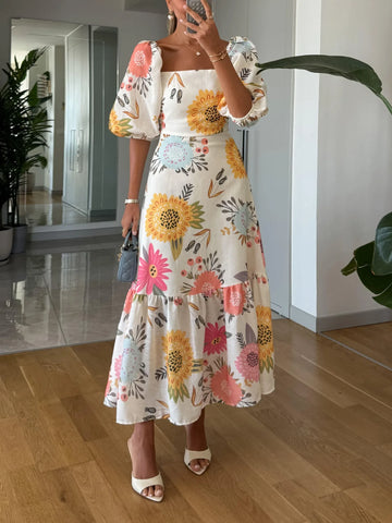 Women's floral midi dress with square neck and puff sleeves, front view