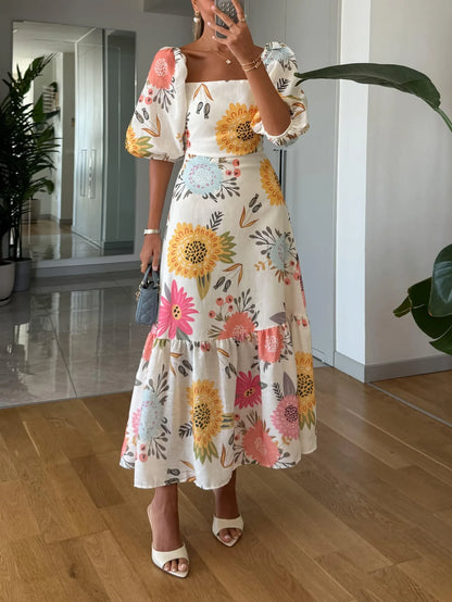 Women's floral midi dress with square neck and puff sleeves, front view