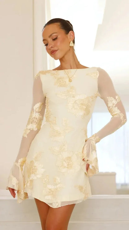 Women's floral mini dress with sheer bell sleeves and open back, cream, studio view