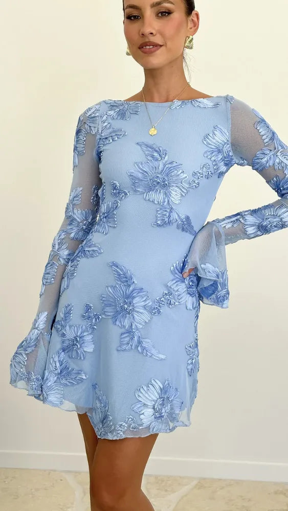 Women's floral mini dress with sheer bell sleeves and open back, light blue, close-up of the sleeve