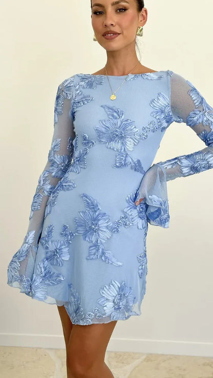 Women's floral mini dress with sheer bell sleeves and open back, light blue, close-up of the sleeve