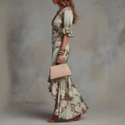 Women's floral V-neck maxi dress with bell sleeves and asymmetric hem, green, side view with handbag