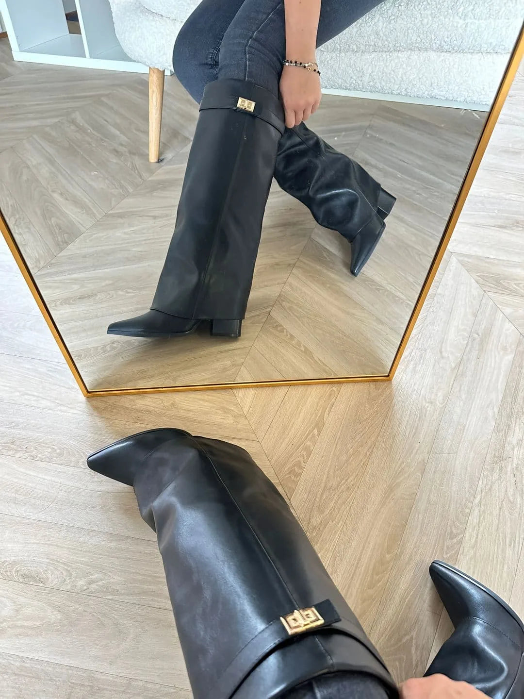 Women's fold-over knee-high boots with gold buckle, black, mirror view