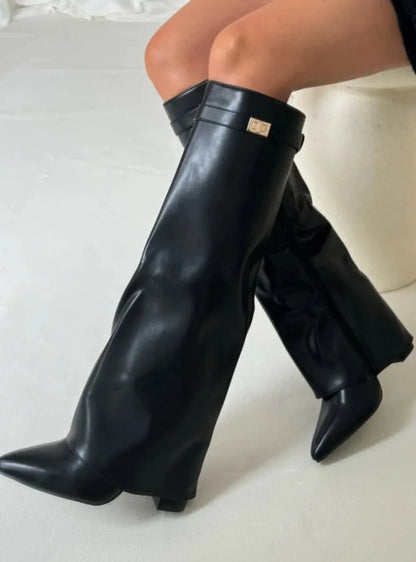Women's fold-over knee-high boots with gold buckle, black, side view